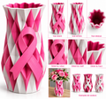 Vase géométrique blanc avec ruban rose de soutien, décor en forme de nœud.