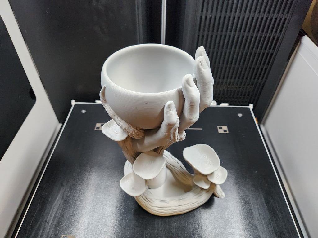 Vase à main en forme de champignon